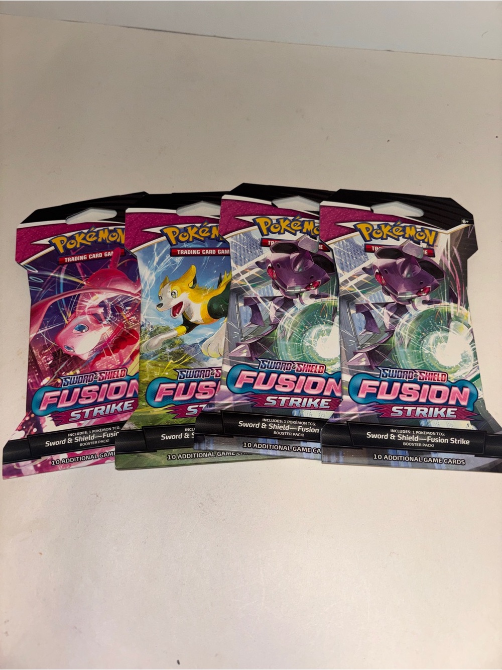 Pokemon Sword & Shield Fusion Strike Booster Packs - Pink, Purple, Green, Blue
